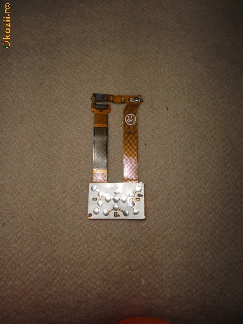 NOKIA E65 BANDA FLEX foto mare
